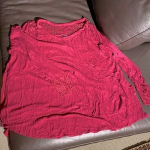 Pink long sleeved shirt with lace accents